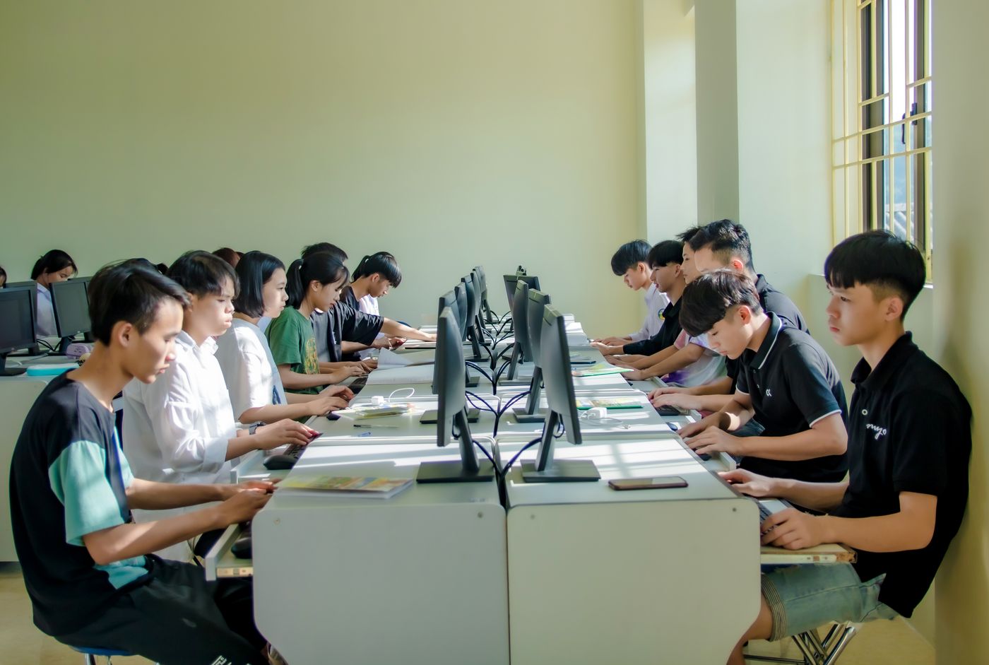 People learning together in a computer classroom